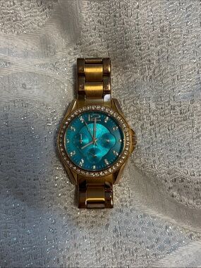Fossil Gold Tone Bracelet Watch with Teal Dial and Crystal Bezel